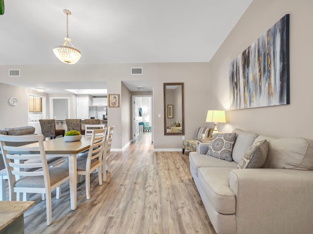 4205 Indian Bayou Trl Unit 10, Destin, FL 32541 - living area with light wood finished floors and baseboards