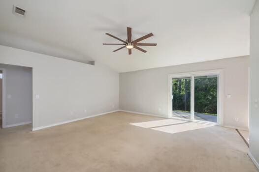 430 Hatchee Dr, Crestview, FL 32536 - empty room featuring lofted ceiling, a ceiling fan, carpet, and baseboards