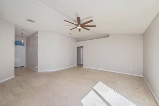 430 Hatchee Dr, Crestview, FL 32536 - spare room featuring ceiling fan, baseboards, and carpet floors