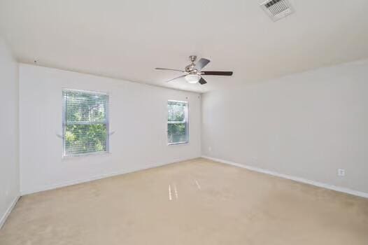 430 Hatchee Dr, Crestview, FL 32536 - empty room featuring light colored carpet, ceiling fan, and baseboards