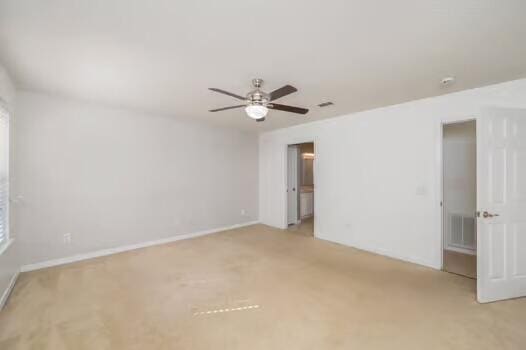 430 Hatchee Dr, Crestview, FL 32536 - unfurnished room with a ceiling fan, light carpet, and baseboards