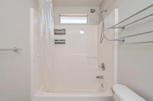 430 Hatchee Dr, Crestview, FL 32536 - full bathroom with toilet and shower / washtub combination