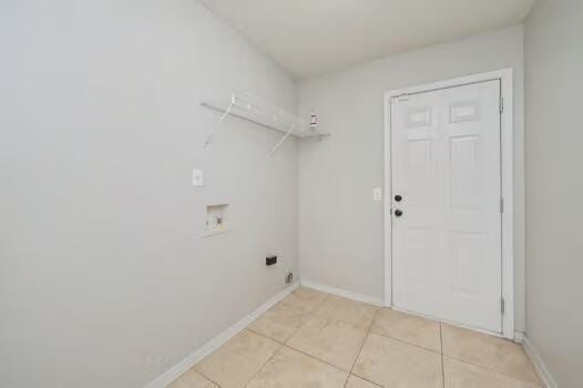 430 Hatchee Dr, Crestview, FL 32536 - laundry room with hookup for a washing machine, light tile patterned floors, and baseboards