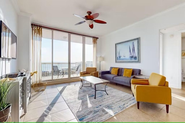 15100 Emerald Coast Pkwy Unit Ph4, Destin, FL 32541 - living area with light tile patterned flooring, a ceiling fan, floor to ceiling windows, and crown molding