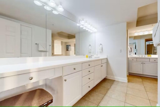 15100 Emerald Coast Pkwy Unit Ph4, Destin, FL 32541 - bathroom with tile patterned flooring, vanity, and baseboards