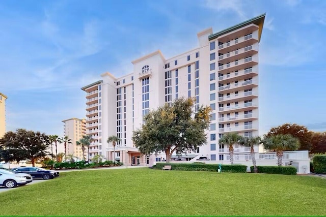 15100 Emerald Coast Pkwy Unit Ph4, Destin, FL 32541 - view of apartment building / complex featuring uncovered parking