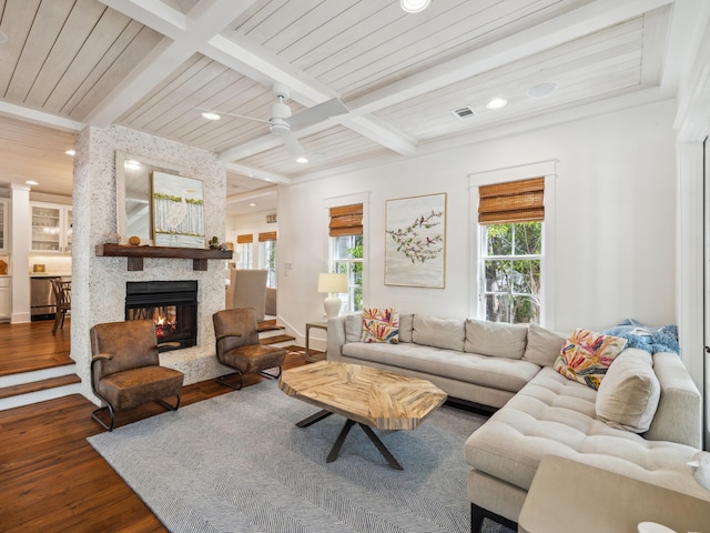 121 Red Cedar Way, Santa Rosa Beach, FL 32459 - living area featuring wood finished floors, a large fireplace, recessed lighting, and wooden ceiling with exposed beams
