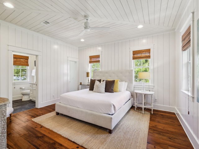 121 Red Cedar Way, Santa Rosa Beach, FL 32459 - bedroom featuring multiple windows, wooden ceiling, dark wood-style flooring, and ensuite bathroom
