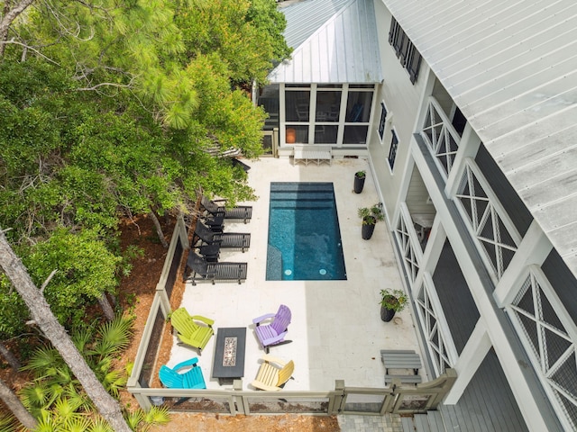 121 Red Cedar Way, Santa Rosa Beach, FL 32459 - rear view of property with a patio and an outdoor pool