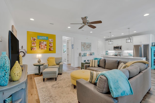 101 Windrow Way Lot 255, Watersound, FL 32461 - living room with a ceiling fan, recessed lighting, light wood-type flooring, and baseboards