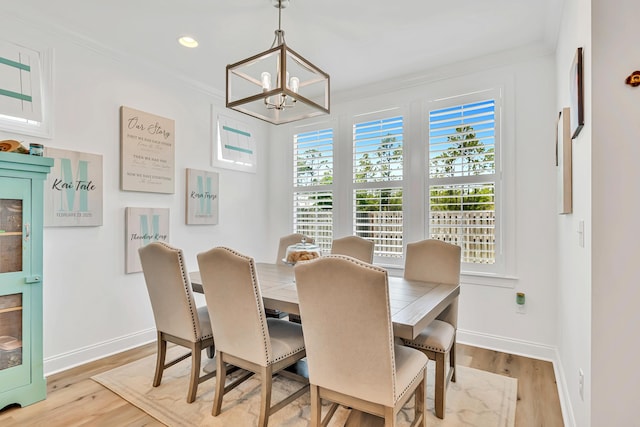 101 Windrow Way Lot 255, Watersound, FL 32461 - dining area with a chandelier, light wood-style flooring, ornamental molding, baseboards, and recessed lighting