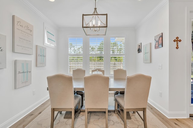 101 Windrow Way Lot 255, Watersound, FL 32461 - dining room with a chandelier, light wood-type flooring, crown molding, and baseboards