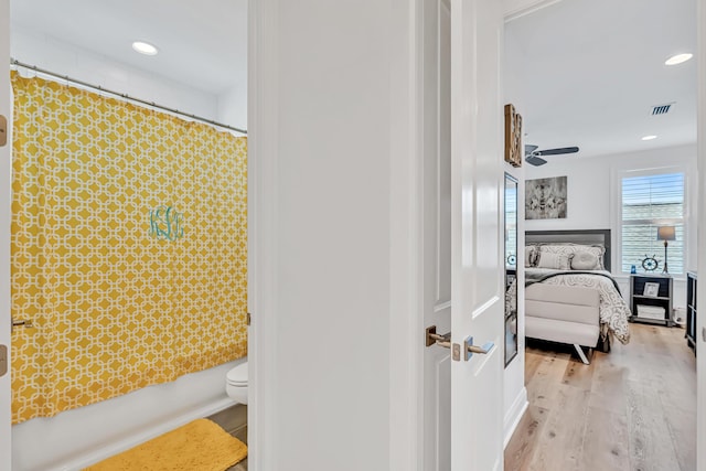 101 Windrow Way Lot 255, Watersound, FL 32461 - bathroom featuring ensuite bath, wood finished floors, toilet, and recessed lighting
