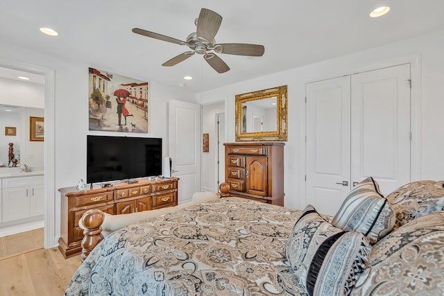101 Windrow Way Lot 255, Watersound, FL 32461 - bedroom with a closet, recessed lighting, light wood-style flooring, ensuite bathroom, and a ceiling fan