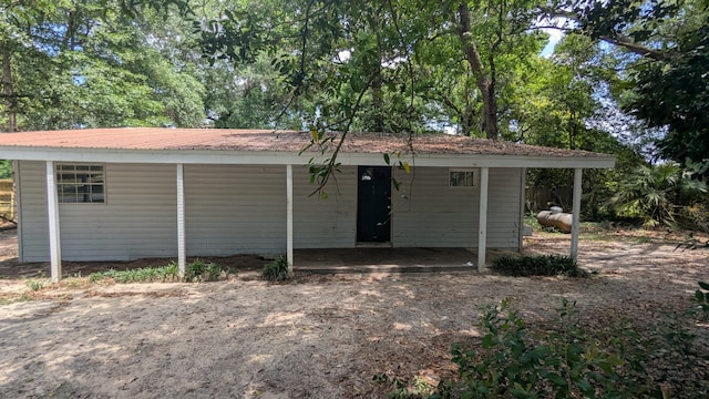 view of front facade with an attached carport