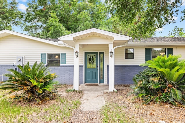 540 John King Rd, Crestview, FL 32539 - doorway to property featuring brick siding