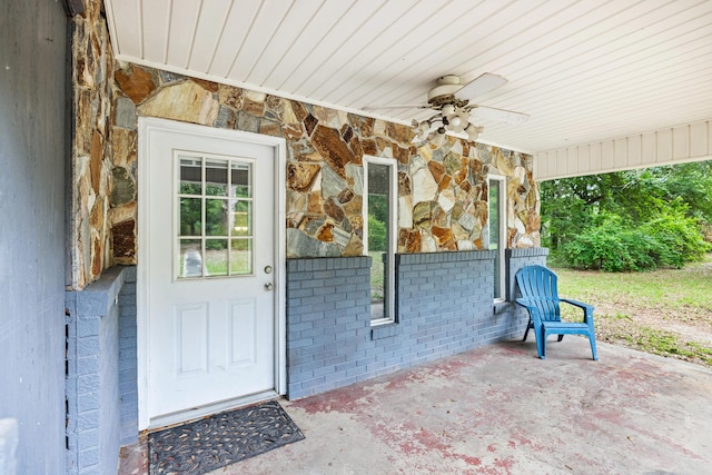 540 John King Rd, Crestview, FL 32539 - doorway to property with a ceiling fan, brick siding, and stone siding
