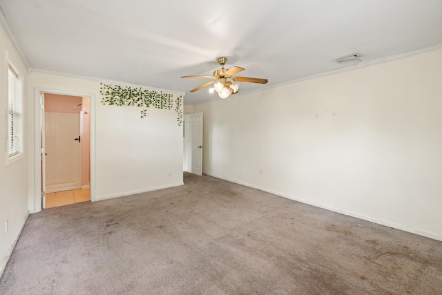 540 John King Rd, Crestview, FL 32539 - unfurnished room with carpet floors, ceiling fan, crown molding, and baseboards