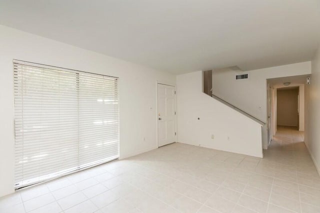 3871 Indian Trl Unit 2E, Destin, FL 32541 - empty room featuring healthy amount of natural light