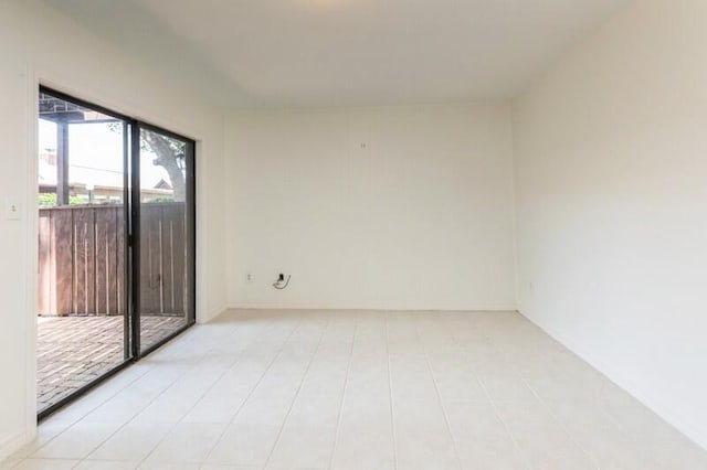 3871 Indian Trl Unit 2E, Destin, FL 32541 - empty room featuring baseboards and light tile patterned floors