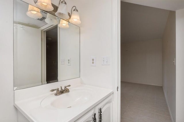 3871 Indian Trl Unit 2E, Destin, FL 32541 - bathroom with vanity, tile patterned flooring, and baseboards