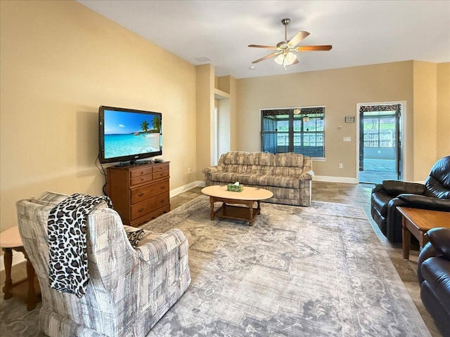 8296 Randall Dr, Navarre, FL 32566 - living area featuring a ceiling fan and baseboards