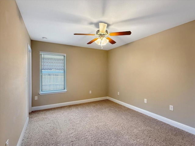 8296 Randall Dr, Navarre, FL 32566 - unfurnished room with a ceiling fan, carpet flooring, and baseboards