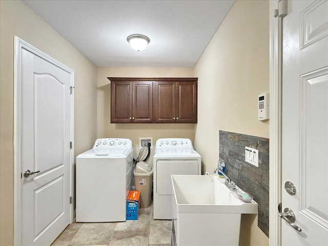 8296 Randall Dr, Navarre, FL 32566 - clothes washing area featuring separate washer and dryer and cabinet space