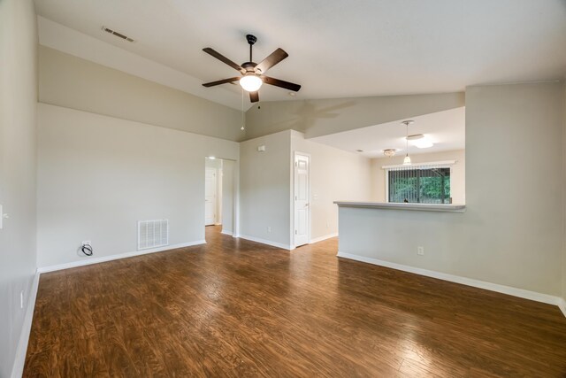 unfurnished living room with ceiling fan, wood finished floors, baseboards, and high vaulted ceiling