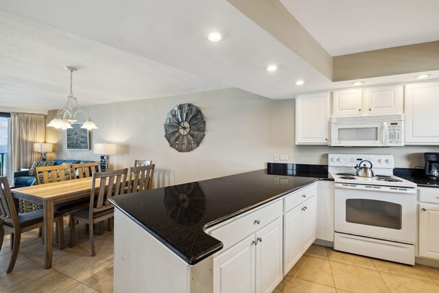 kitchen with white appliances, a peninsula, dark countertops, light tile patterned floors, and recessed lighting