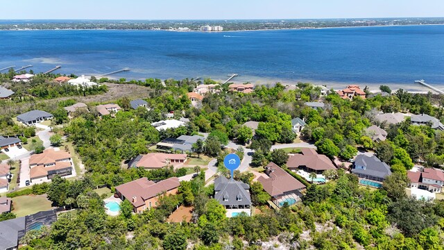 3208 Magnolia Islands Blvd, Panama City Beach, FL 32408 - aerial perspective of suburban area with a nearby body of water