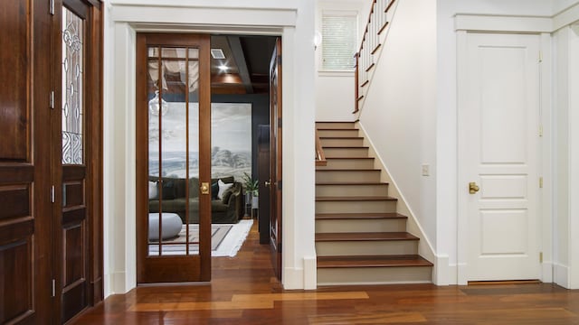 3208 Magnolia Islands Blvd, Panama City Beach, FL 32408 - stairway featuring french doors, wood finished floors, and baseboards
