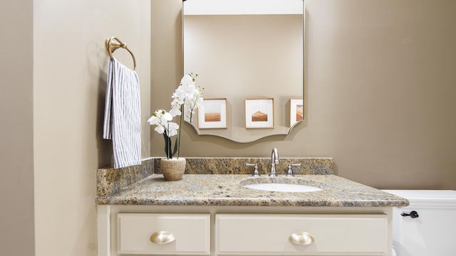 3208 Magnolia Islands Blvd, Panama City Beach, FL 32408 - bathroom featuring vanity and toilet