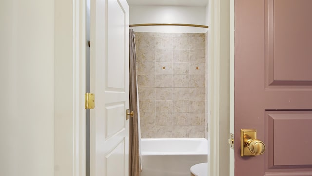 3208 Magnolia Islands Blvd, Panama City Beach, FL 32408 - bathroom featuring toilet and shower / bath combination with curtain