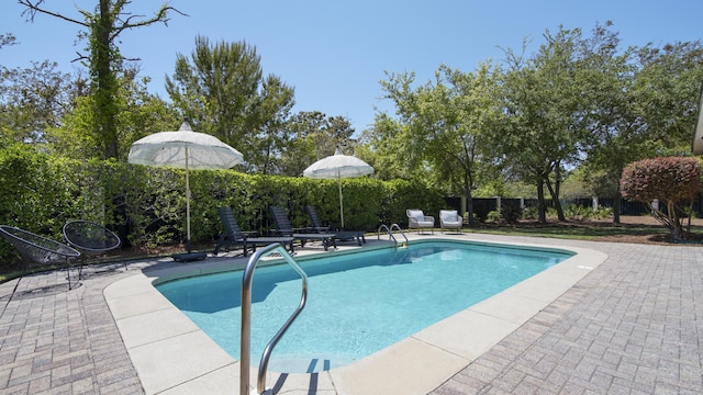 3208 Magnolia Islands Blvd, Panama City Beach, FL 32408 - view of swimming pool with a patio area