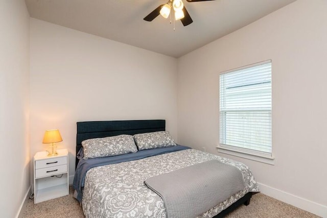 514 Mary Lou Way, Crestview, FL 32539 - bedroom featuring light carpet, baseboards, and a ceiling fan