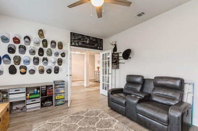 514 Mary Lou Way, Crestview, FL 32539 - living room featuring french doors, a ceiling fan, and wood finished floors