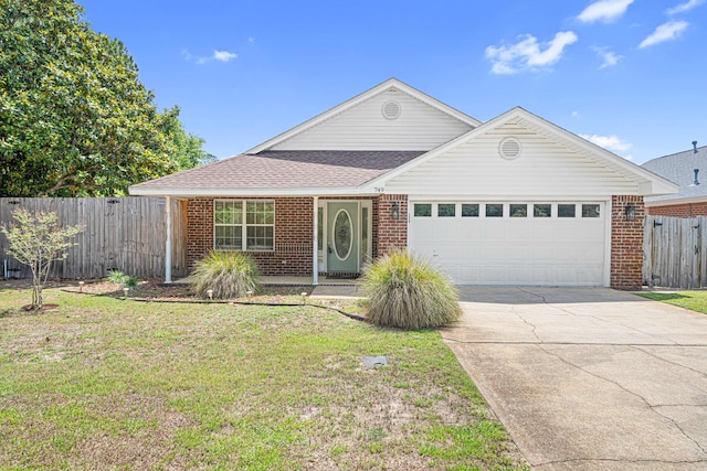 749 Randall Roberts Rd, Fort Walton Beach, FL 32547 - single story home featuring an attached garage, brick siding, driveway, and a shingled roof