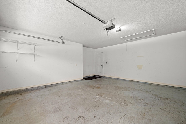 749 Randall Roberts Rd, Fort Walton Beach, FL 32547 - garage with a garage door opener and baseboards
