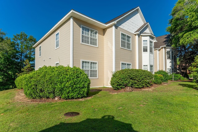 1501 N Partin Dr Unit 264, Niceville, FL 32578 - view of side of property featuring a yard