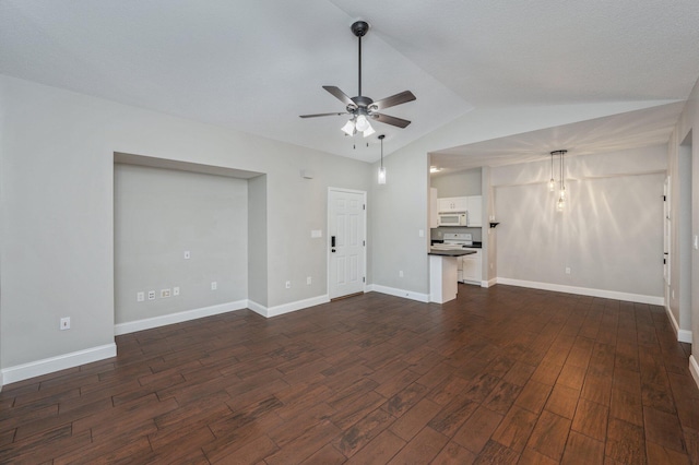 1501 N Partin Dr Unit 264, Niceville, FL 32578 - unfurnished living room featuring ceiling fan, dark wood finished floors, lofted ceiling, and baseboards