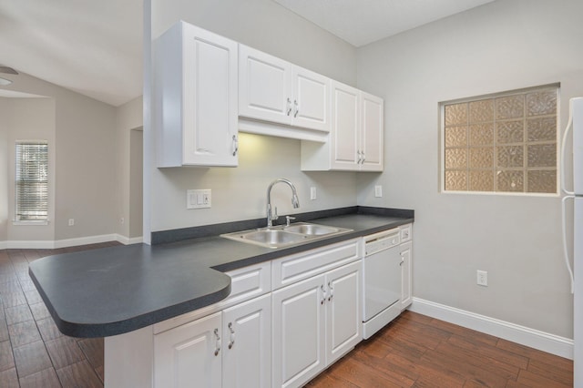 1501 N Partin Dr Unit 264, Niceville, FL 32578 - kitchen featuring a sink, white dishwasher, dark countertops, dark wood-style floors, and white cabinetry