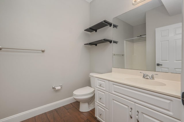 1501 N Partin Dr Unit 264, Niceville, FL 32578 - bathroom with toilet, wood finished floors, baseboards, a shower, and vanity