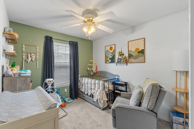 407 Apple Dr, Crestview, FL 32536 - carpeted bedroom featuring a textured ceiling and a ceiling fan