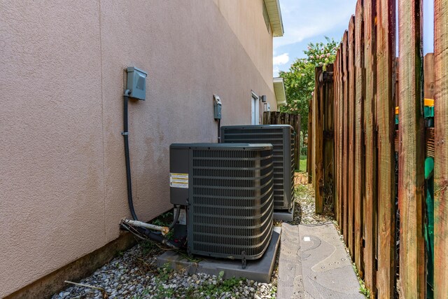1961 Chesapeake Rdg, Fort Walton Beach, FL 32547 - exterior view of a cooling unit and stucco siding