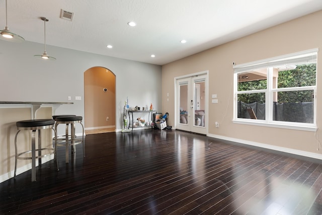 1961 Chesapeake Rdg, Fort Walton Beach, FL 32547 - living room featuring arched walkways, wood finished floors, recessed lighting, and french doors