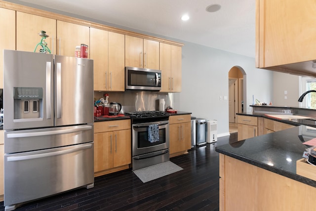 1961 Chesapeake Rdg, Fort Walton Beach, FL 32547 - kitchen with appliances with stainless steel finishes, arched walkways, light brown cabinets, dark wood-style floors, and recessed lighting