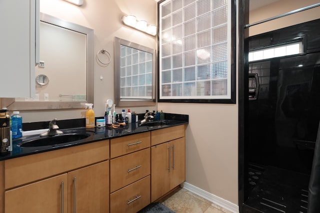 1961 Chesapeake Rdg, Fort Walton Beach, FL 32547 - bathroom with double vanity, walk in shower, and tile patterned flooring