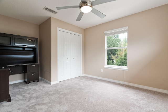 1961 Chesapeake Rdg, Fort Walton Beach, FL 32547 - unfurnished bedroom featuring light colored carpet, a closet, and a ceiling fan