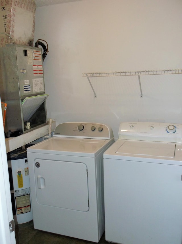 302 Olympia Ct, Fort Walton Beach, FL 32547 - laundry area with separate washer and dryer and water heater